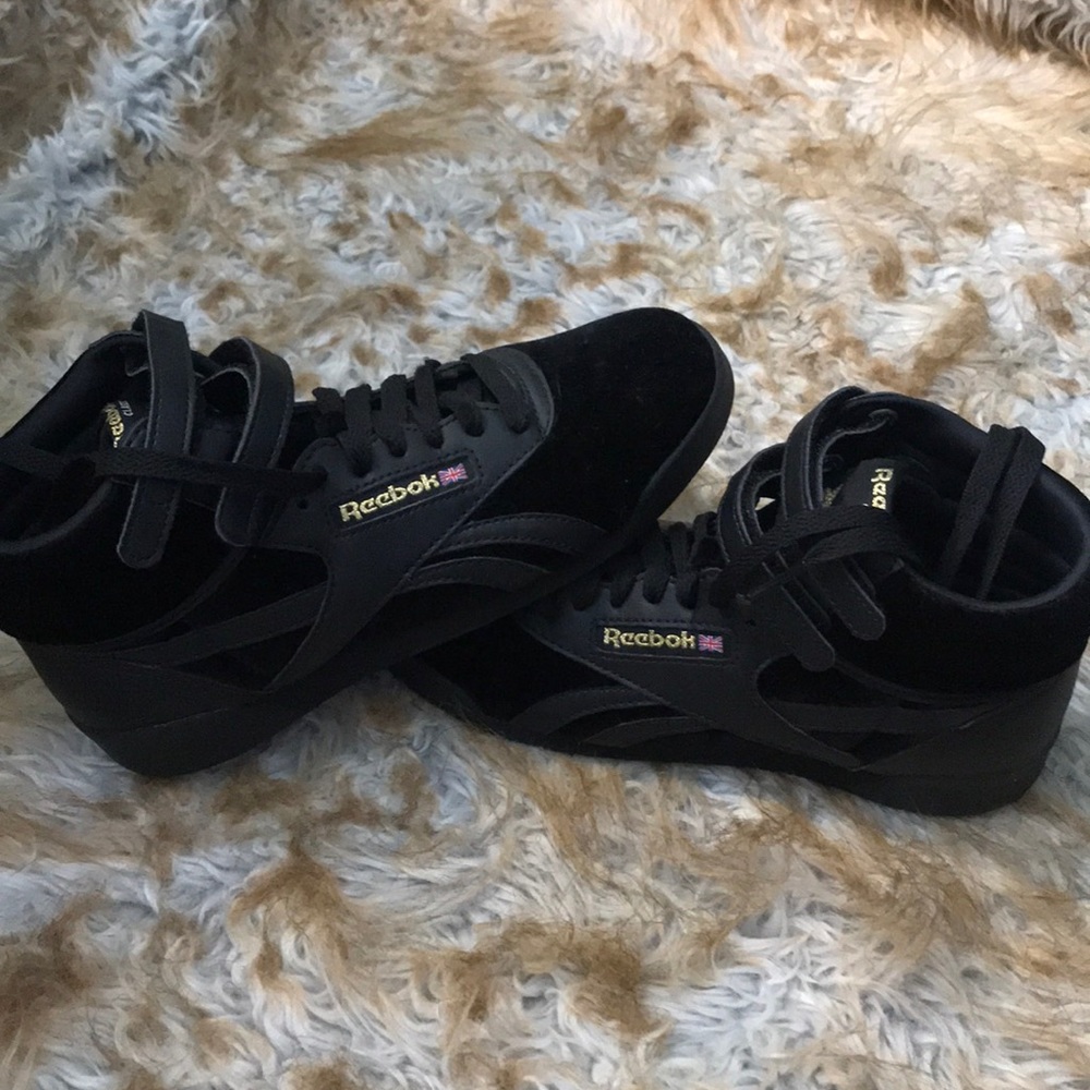 Black believer Reebok high tops